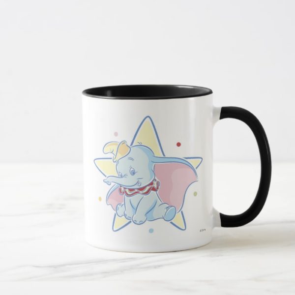 Dumbo sitting star background mug
